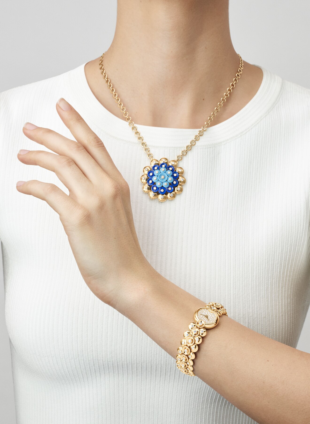 High Jewelry watches collection, watch and necklace, yellow gold and diamonds, hand pointing upwards, Van Cleef & Arpels