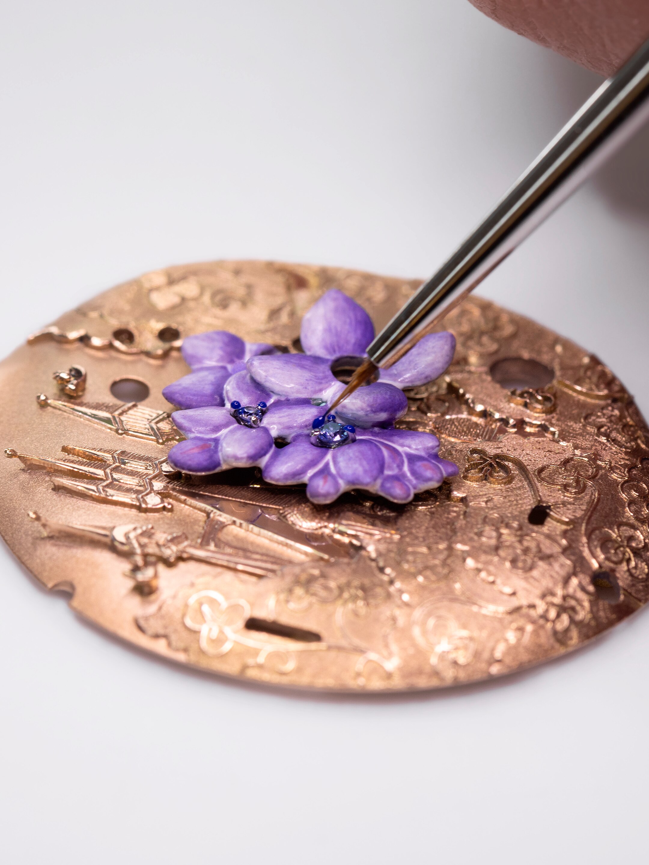 Lady Arpels Belle au Bois Dormant watch. 18K rose gold, diamond, emerald, mandarin garnet, ruby, sapphire. Extraordinary Dials collection, Van Cleef & Arpels.