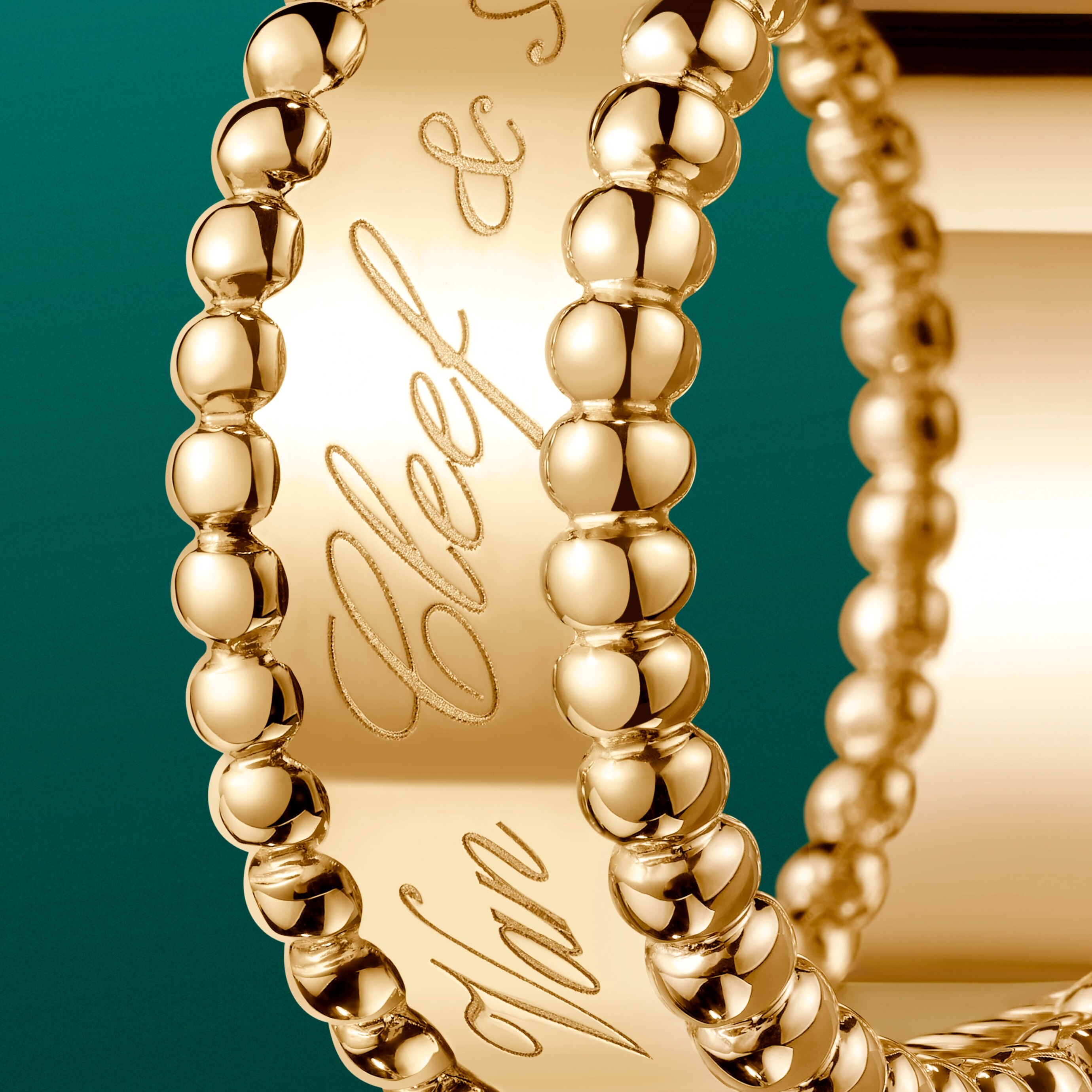 Perlée signature ring, 18K yellow gold. Perlée® collection, Van Cleef & Arpels.